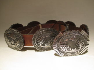 concho belt of sterling silver with detailed stamping