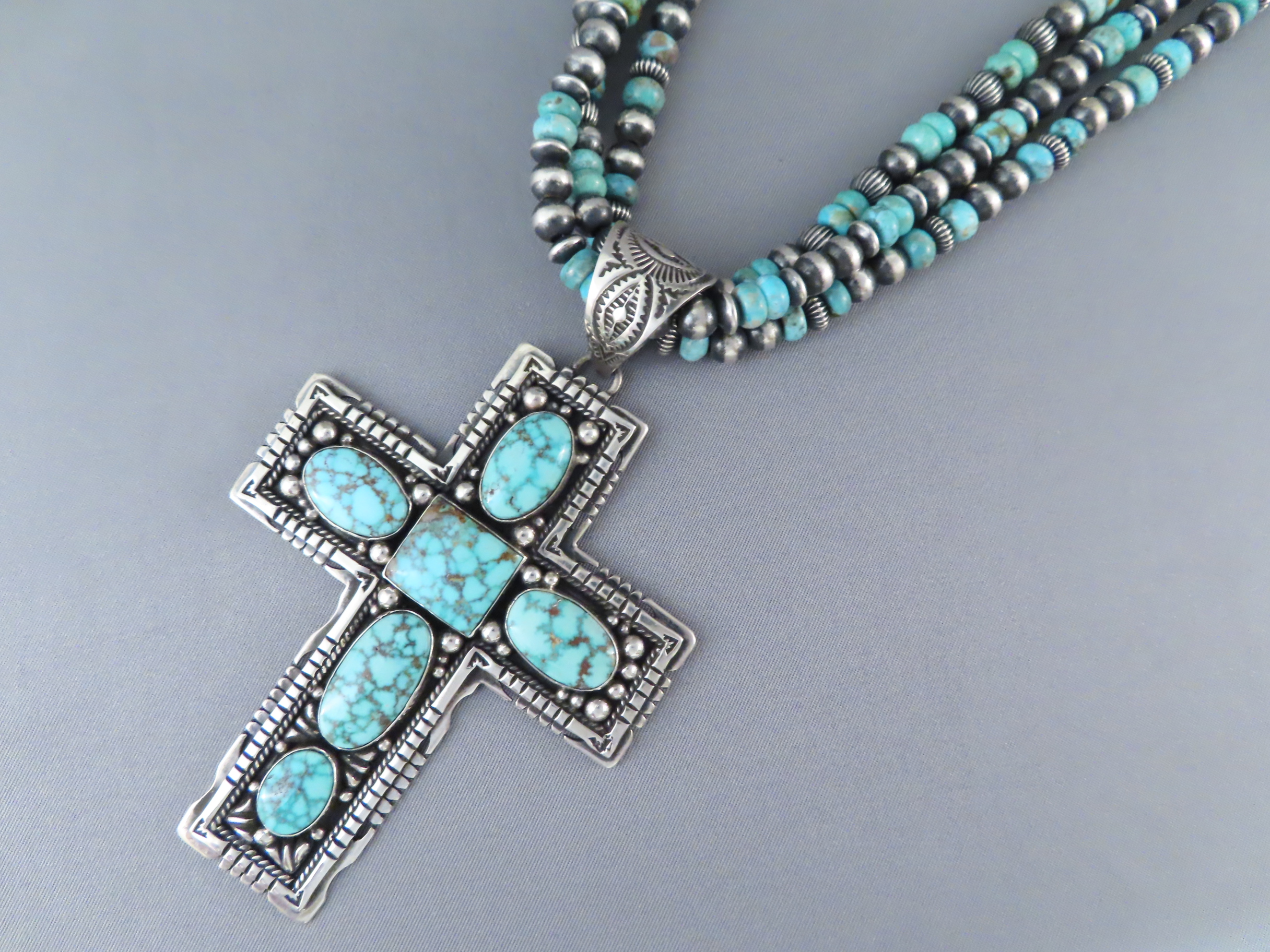 Silver cross teal discount