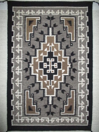 Two Grey Hills Rug by Navajo weaving artist, Caroline Lewis. Small size Navajo Rug.