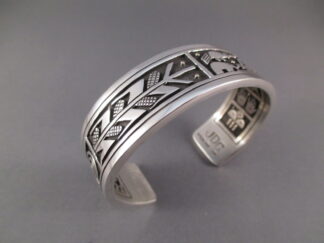 Sterling Silver Overlay 'Storyteller' Cuff Bracelet by Santo Domingan jewelry artist, Joseph D. Coriz