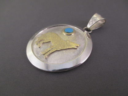 Dina Huntinghorse ‘Wolf’ Pendant with Silver, Gold, and Sleeping Beauty Turquoise