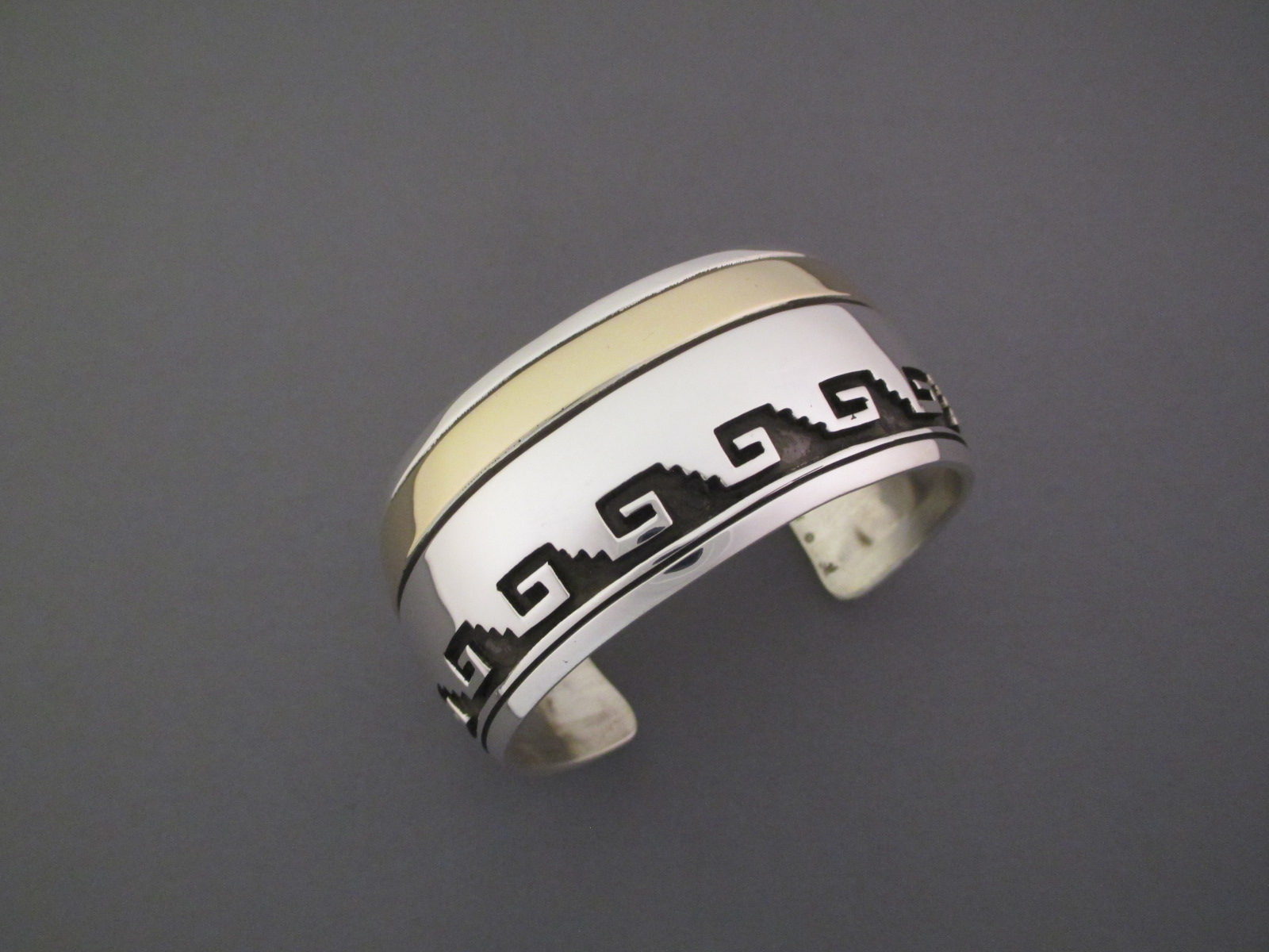 Sterling Silver & 14 kt Gold Cuff Bracelet by Herbert Begaye