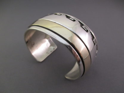 Sterling Silver & 14 kt Gold Cuff Bracelet by Herbert Begaye