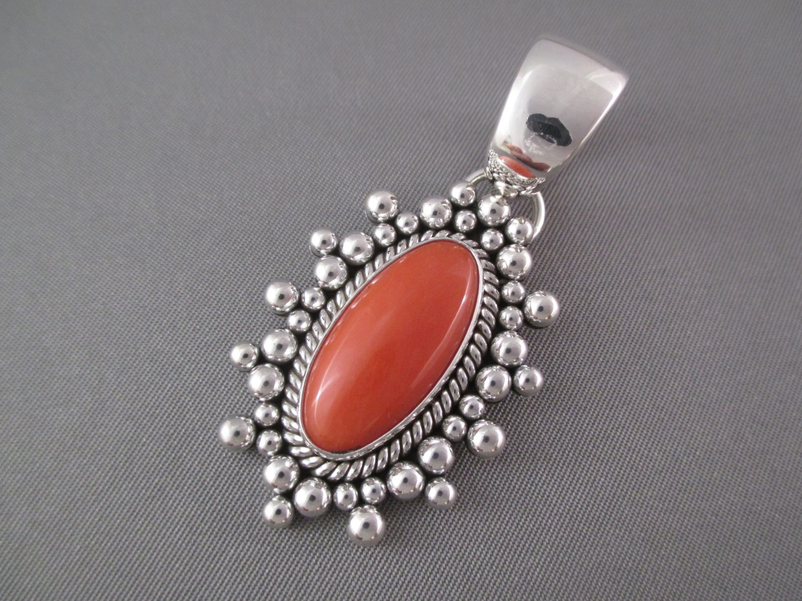 Native American Jewelry - Coral Pendant by Navajo jewelry artist, Artie Yellowhorse $775-