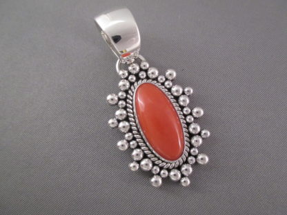 Coral Pendant in Sterling Silver by Artie Yellowhorse