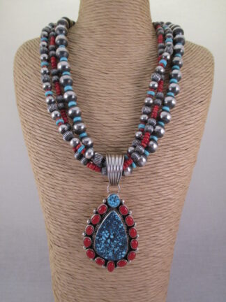 Kingman Turquoise & Coral Pendant Necklace by Native American Navajo Indian jewelry artist, LaRose Ganadonegro $1,725-