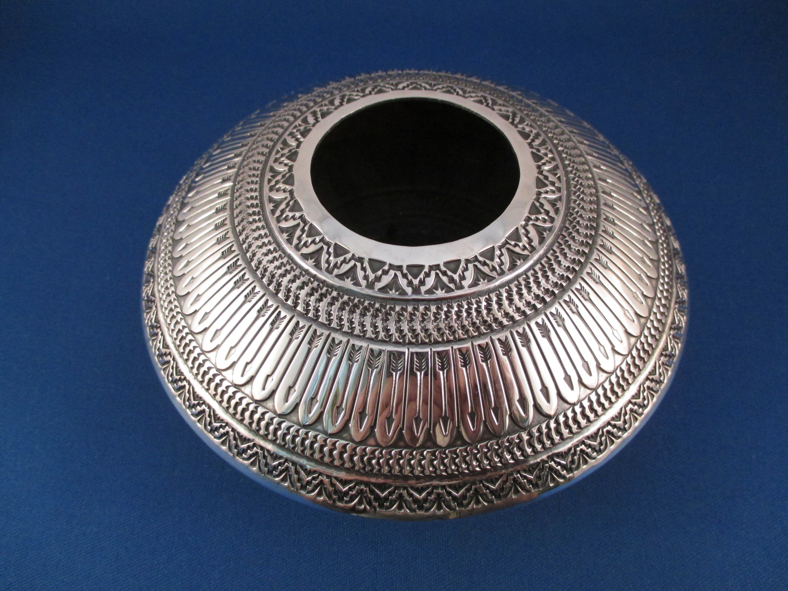 Sterling Silver pot - bowl by Award-Winning Navajo jewelry artist & silversmith, Sunshine Reeves $2,395-