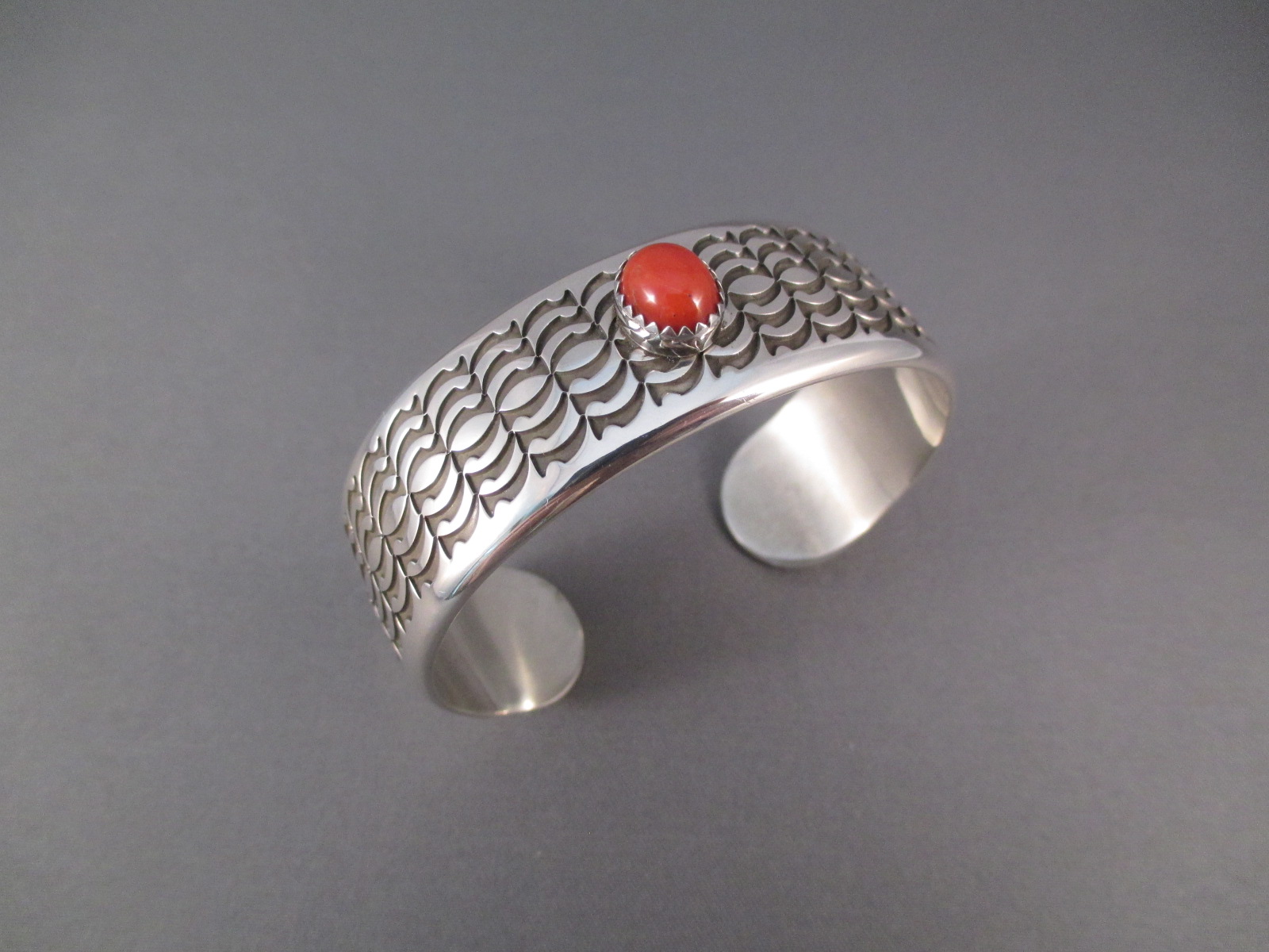Sterling Silver & Coral Cuff Bracelet by Navajo jewelry artist, Norbert Peshlakai $775-