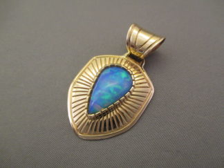 Gold & Opal Pendant - Australian Opal & 14kt Gold Pendant by Native American Indian jewelry artist, Jake Livingson $3,600-