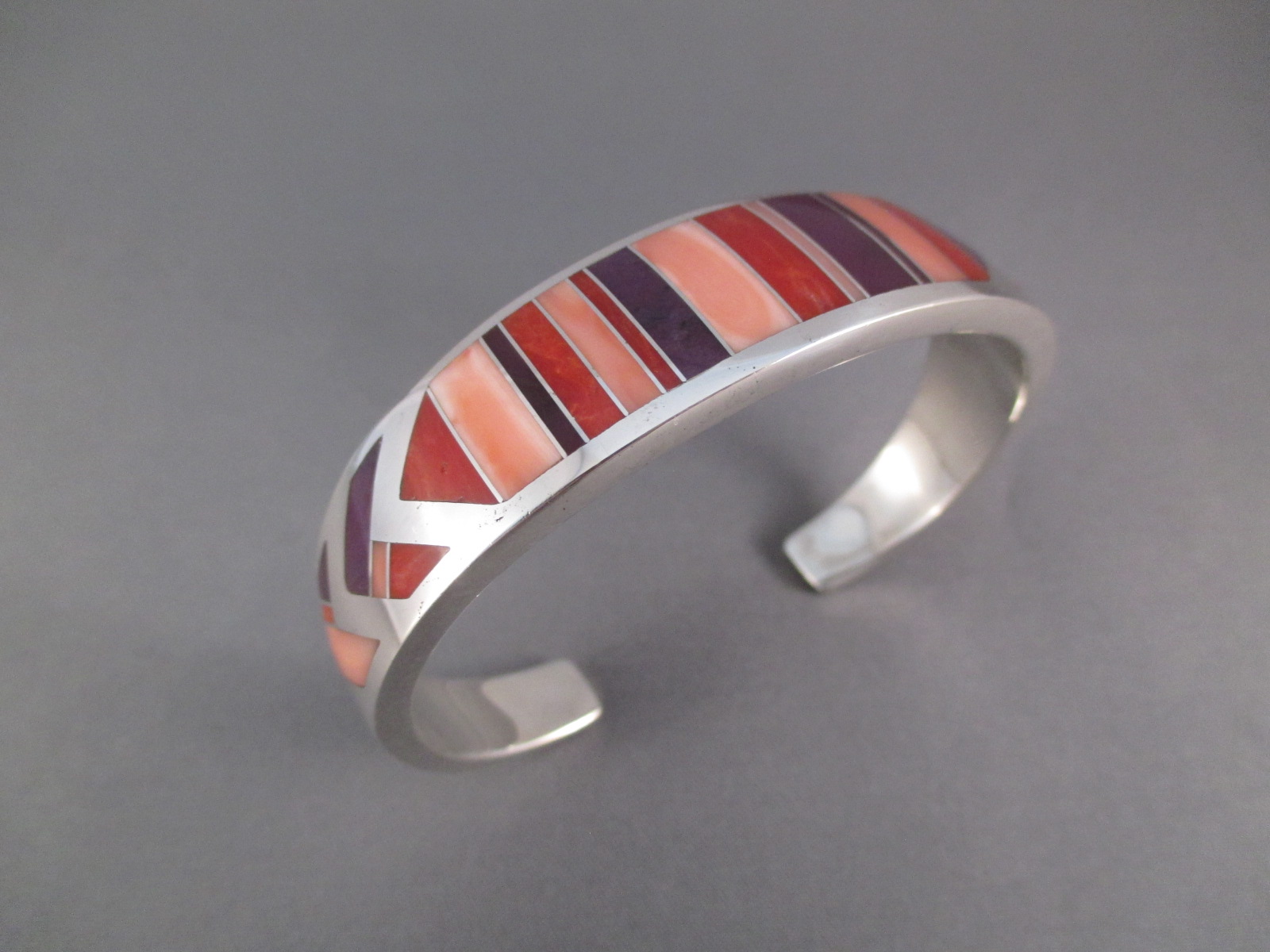 Sugilite & Coral Inlay Cuff Bracelet by Navajo jewelry artist, Ray Tracey $650-