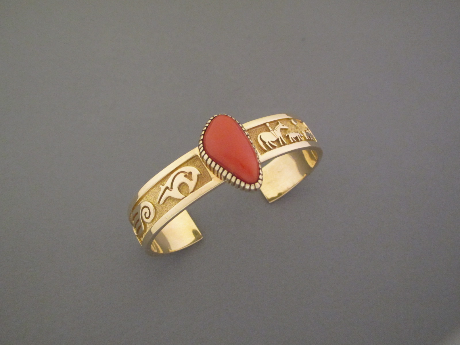 Coral & Gold Bracelet - 14kt Gold & Coral Cuff Bracelet by Navajo Indian jewelry artist, Robert Taylor $4,200-