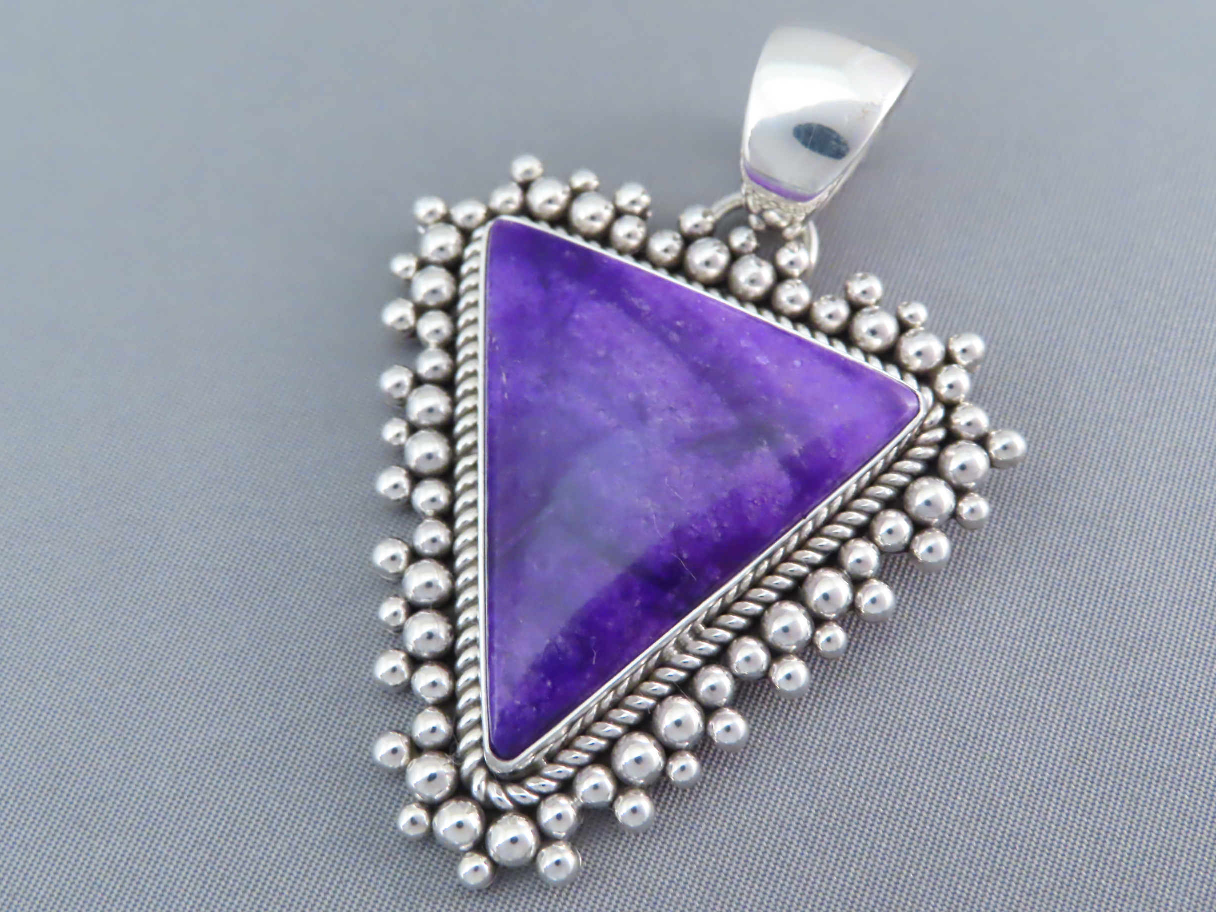 Larger Sugilite Pendant in Sterling Silver by Native American (Navajo) jewelry artist, Artie Yellowhorse $1,600- FOR SALE