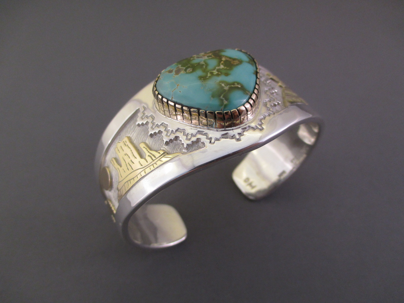 Sterling Silver & Royston Turquoise & 14kt Gold Cuff Bracelet by Native American jewelry artist, Dina Huntinghorse $1,400-