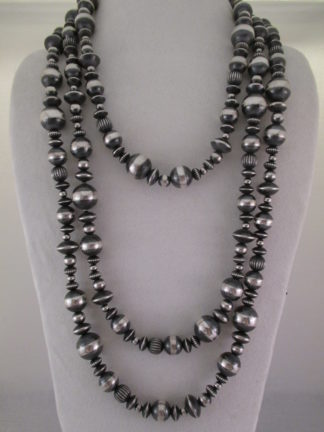 Long Multi-Shaped Sterling Silver Bead Necklace (80'' Long) $1,295-