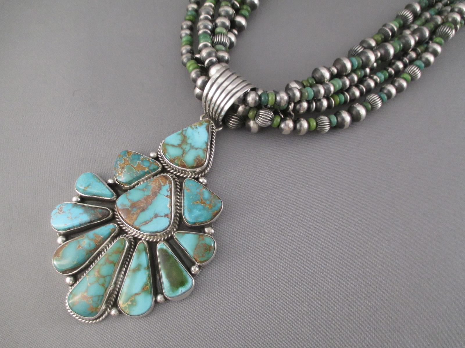 silver pendant and earring set