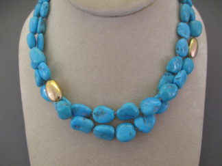 Short 2-Strand Sleeping Beauty Turquoise & 14kt Gold Necklace by Native American jewelry artists, Curtis Pete & Lisa Chavez $4,295-