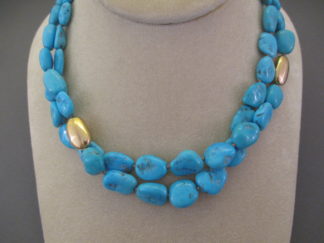 Short 2-Strand Sleeping Beauty Turquoise & 14kt Gold Necklace by Native American jewelry artists, Curtis Pete & Lisa Chavez $4,295-
