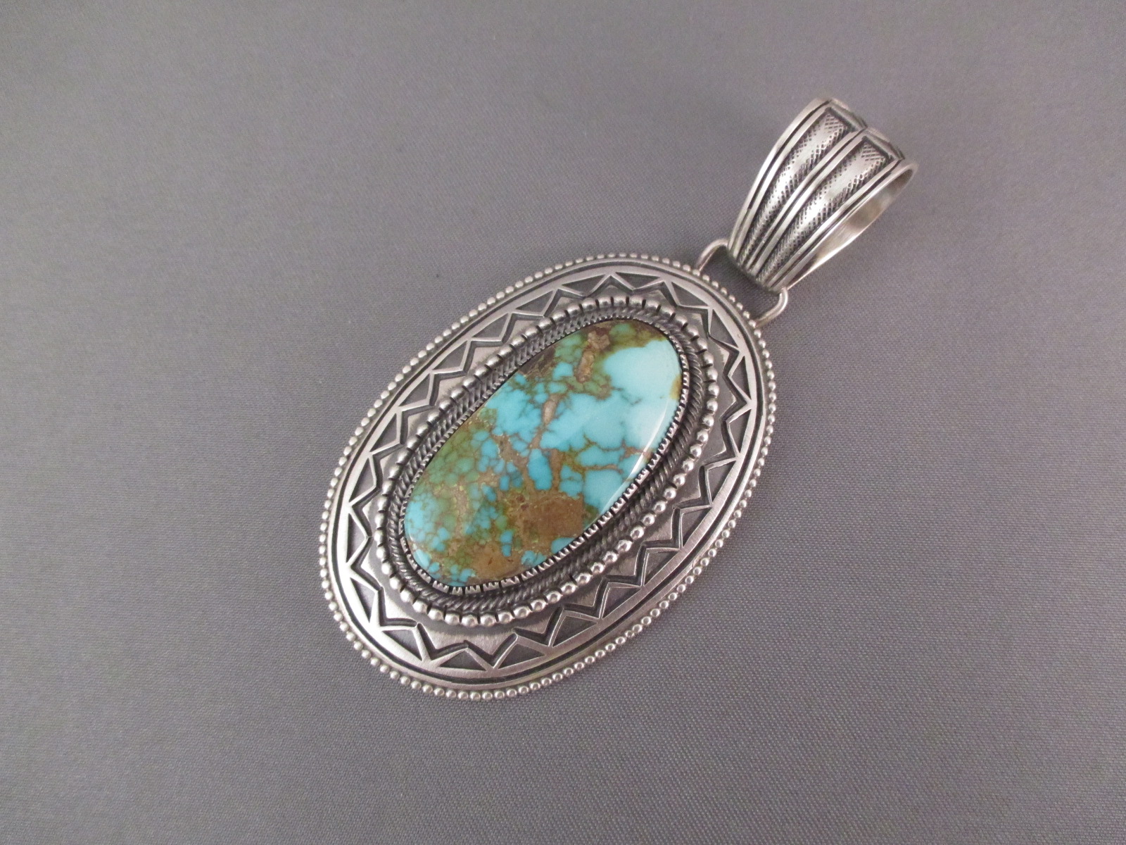 Sterling Silver & Carico Lake Turquoise Pendant by Calvin Martinez