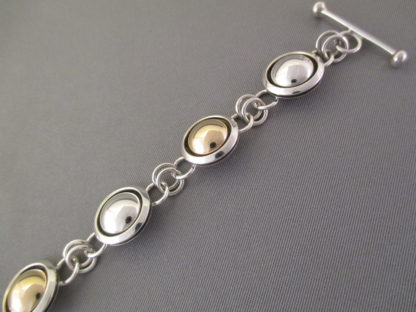 Sterling Silver & 14kt Gold Link Bracelet by Artie Yellowhorse