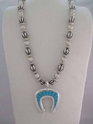 Sterling Silver Multi-Shaped Bead Necklace with Blue Gem Turquoise Inlay Naja by Navajo jewelry artist, Al Joe $2,450-