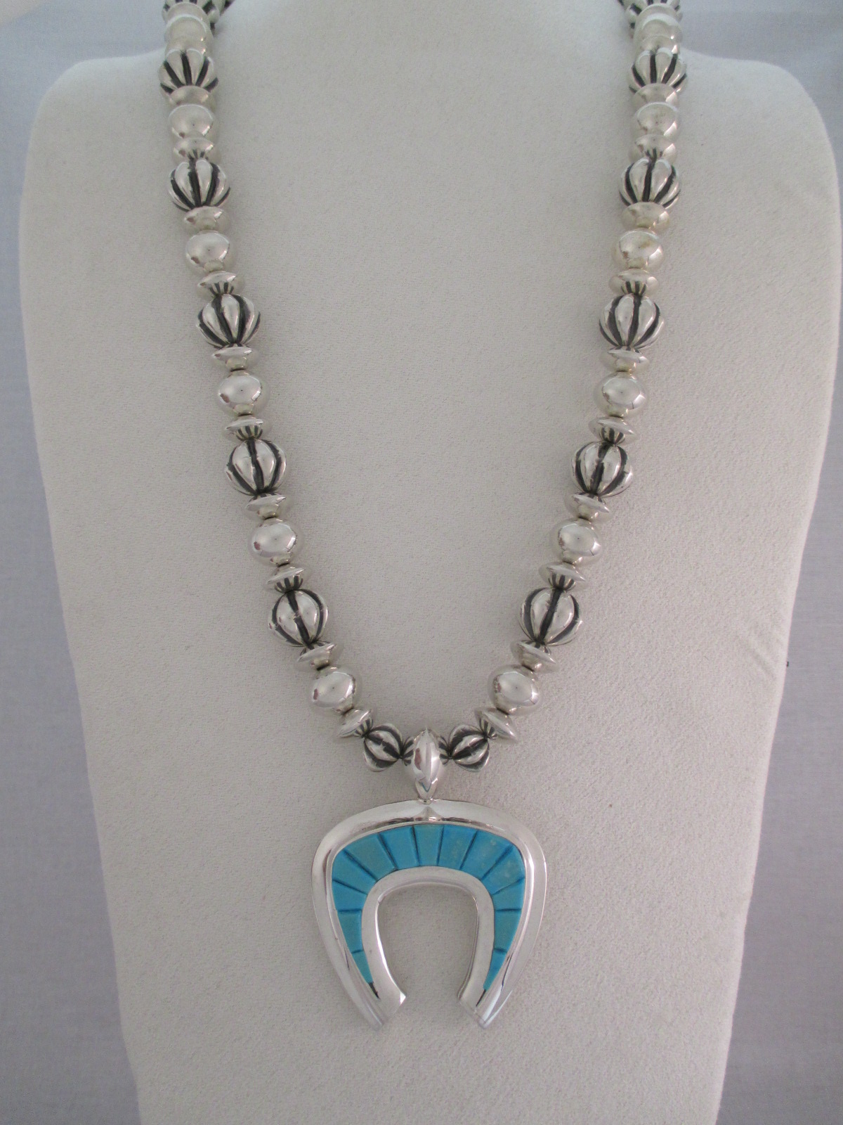 Sterling Silver Multi-Shaped Bead Necklace with Blue Gem Turquoise Inlay Naja by Navajo jewelry artist, Al Joe $2,450-