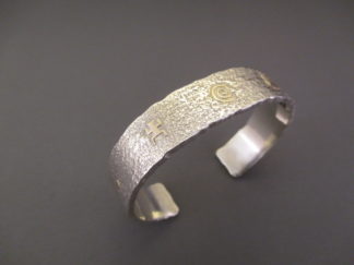 Narrow Sterling Silver & 14kt Gold 'Storyteller' Cuff Bracelet by Navajo jewelry artist, Cody Hunter $650-