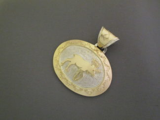 Native American Jewelry - Silver & Gold 'Moose' Pendant by American Indian jewelry artist, Fortune Huntinghorse $550-