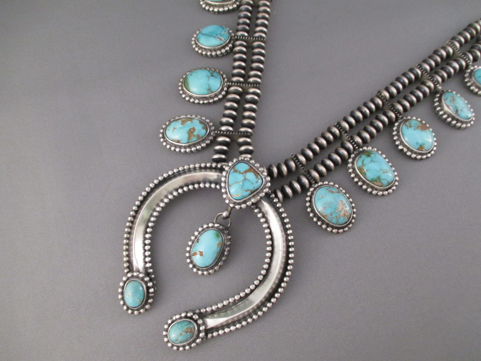 Royston Turquoise Squash Blossom Necklace by Native American (Navajo) jewelry artist, Darrin Livingston $2,770-