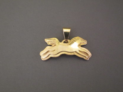 Gold ‘Horse’ Pendant by Dina Huntinghorse