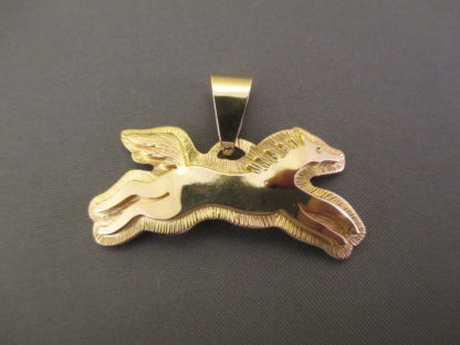 Gold ‘Horse’ Pendant by Dina Huntinghorse