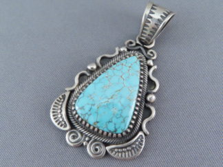 Number Eight Turquoise Pendant by Native American (Navajo) jewelry artist, Delbert Gordon FOR SALE $650-