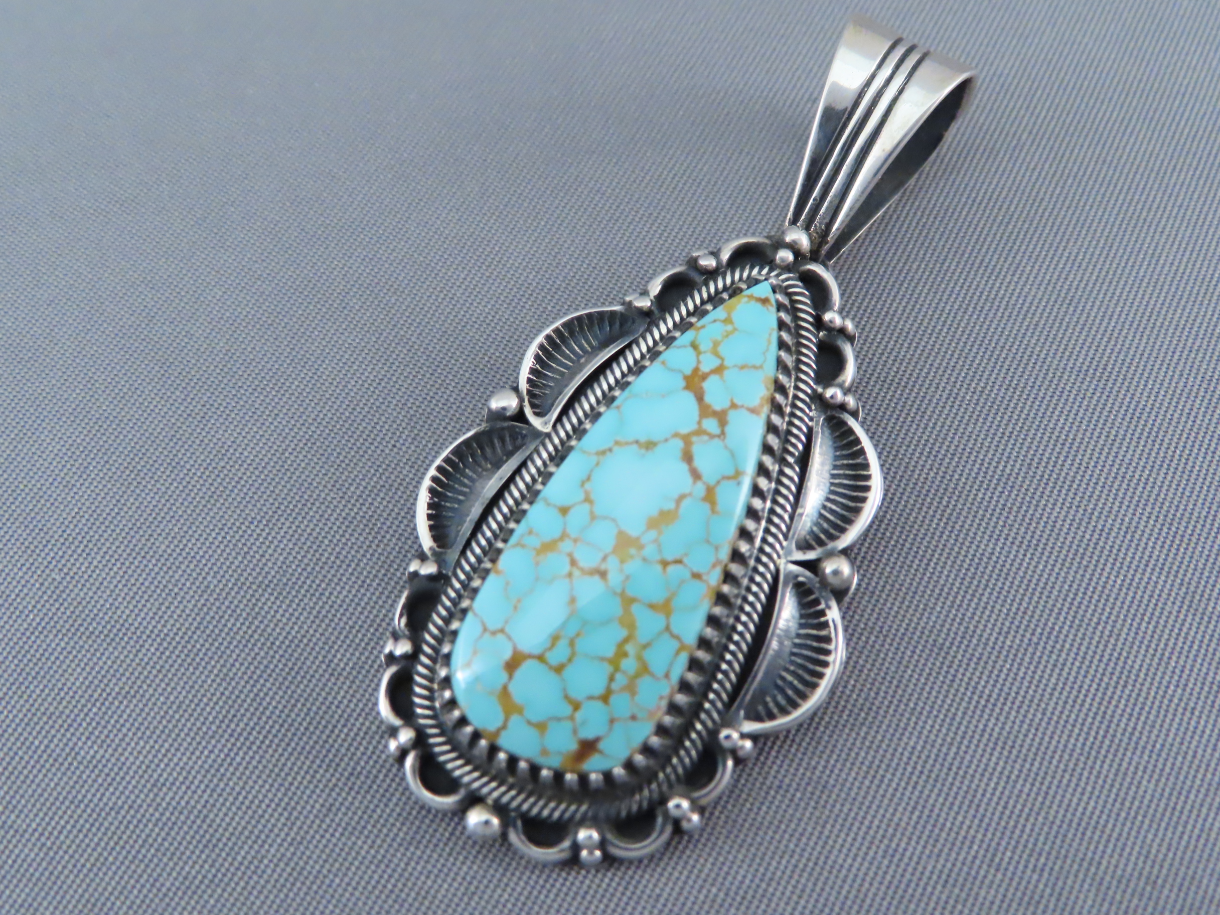 #8 Turquoise Pendant by Delbert Gordon