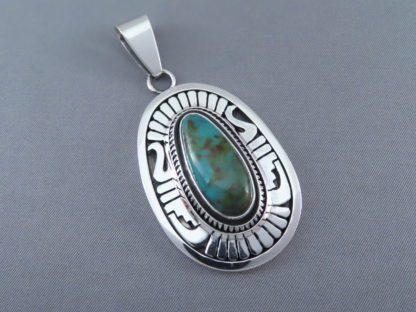 Blue Gem Turquoise Pendant by Leonard Nez