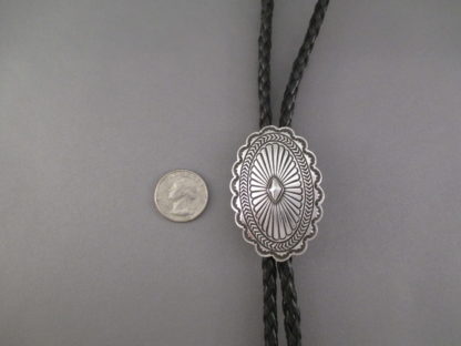 Orville White (Navajo) Stamped Sterling Silver Bolo Tie