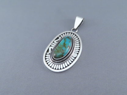 Pendant with Blue Gem Turquoise by Leonard Nez