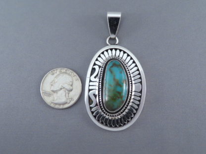 Pendant with Blue Gem Turquoise by Leonard Nez