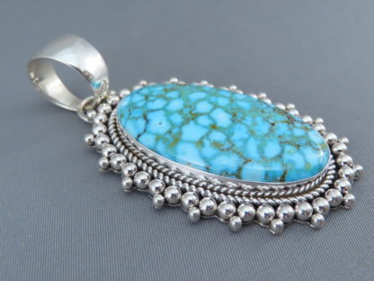 Kingman Turquoise Pendant by Artie Yellowhorse (Navajo)