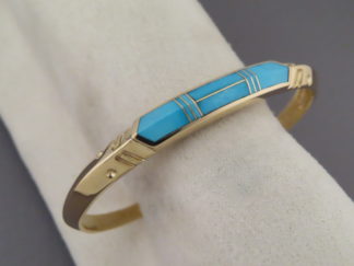 Gold Cuff Bracelet with Turquoise Inlay by Native American jewelry artist, Tim Charlie $2,995- FOR SALE
