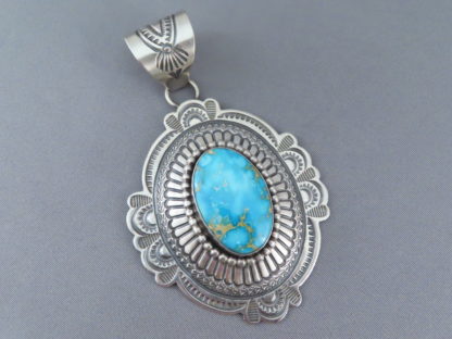 Blue Sonoran Rose Turquoise Pendant by Arnold Blackgoat