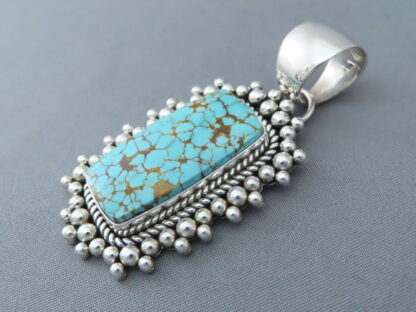 Number Eight Turquoise Pendant by Artie Yellowhorse