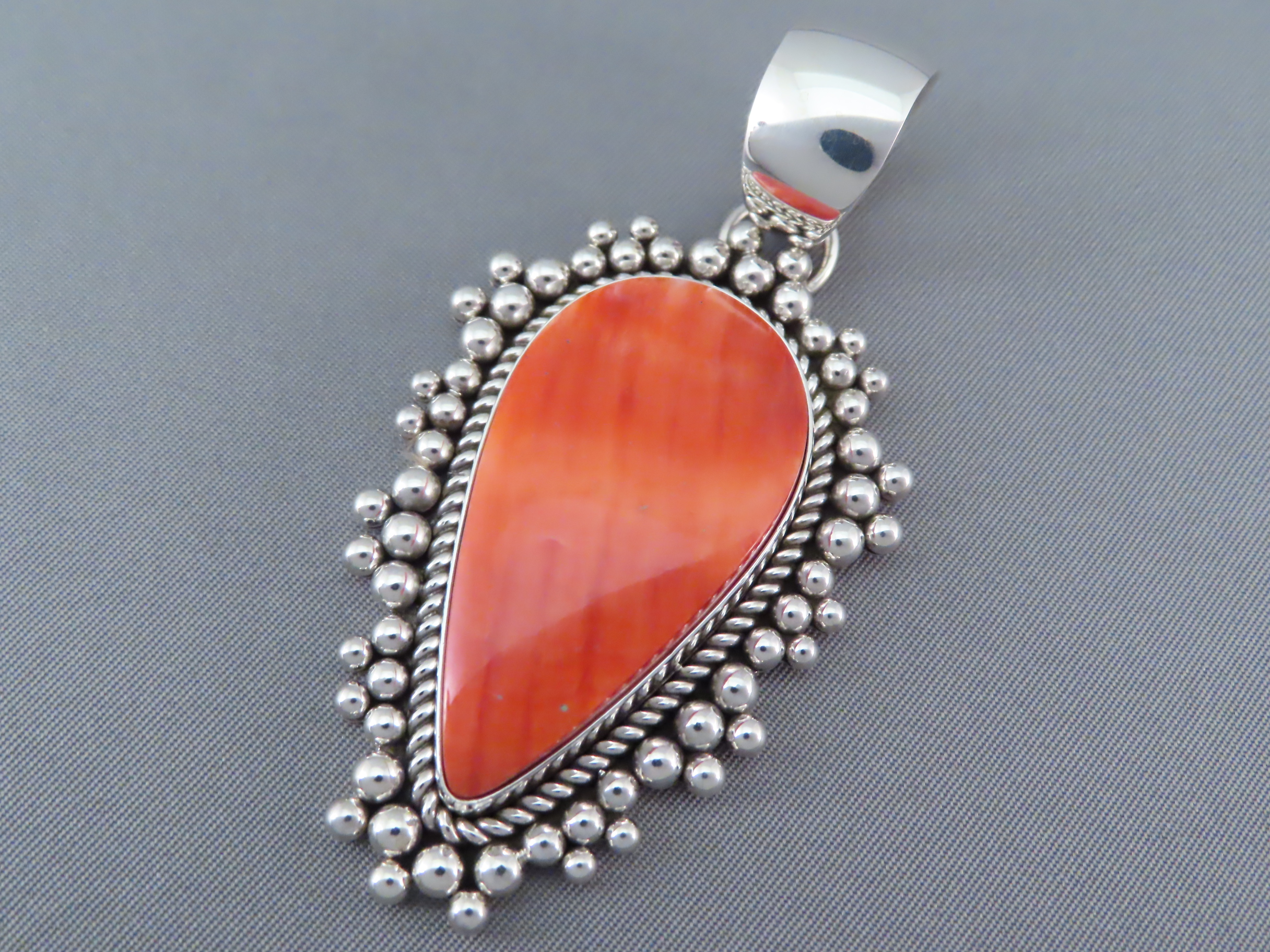 Yellowhorse Jewelry - Orange Spiny Oyters Shell Pendant by Navajo jeweler, Artie Yellowhorse $565- FOR SALE