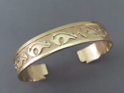 Gold Bracelet with Bears by Robert Taylor