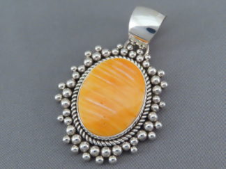 Orange Spiny Oyster Shell Pendant with 'Dots' by Native American Indian jewelry artist, Artie Yellowhorse $425- FOR SALE