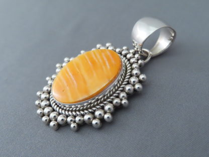 Orange Spiny Oyster Shell Pendant by Artie Yellowhorse