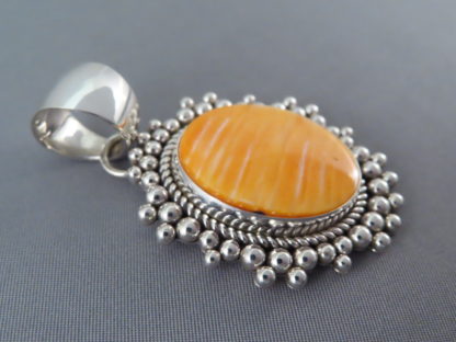 Orange Spiny Oyster Shell Pendant by Artie Yellowhorse