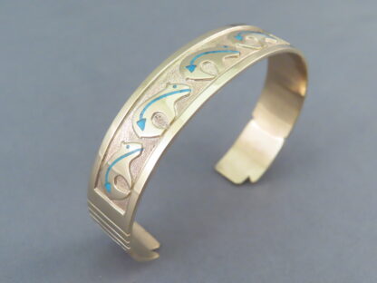 Gold Bracelet with Bears by Robert Taylor