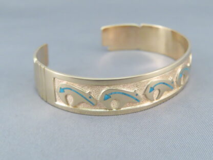 Gold Bracelet with Bears by Robert Taylor