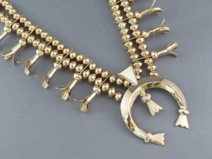 Gold Squash Blossom Necklace by Harrison Jim